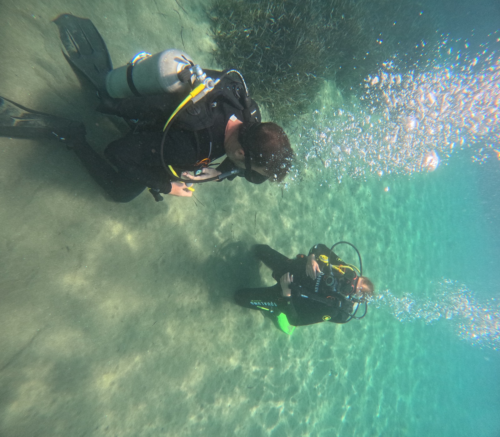 Two divers at the underwater sculptures