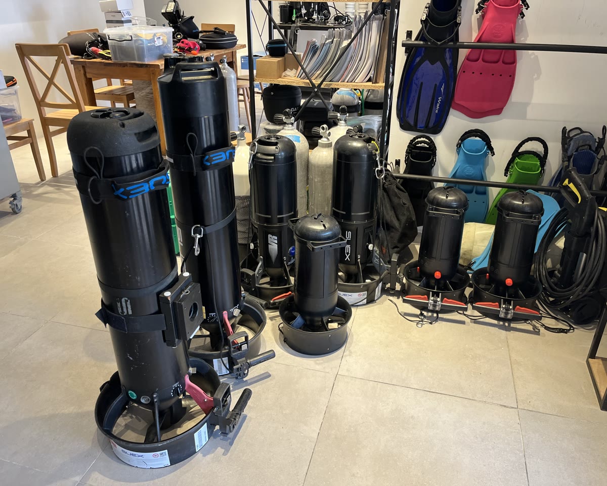 DPV scooters standing ready beside the cylinders